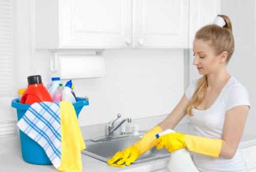 Technician using carpet cleaning equipment